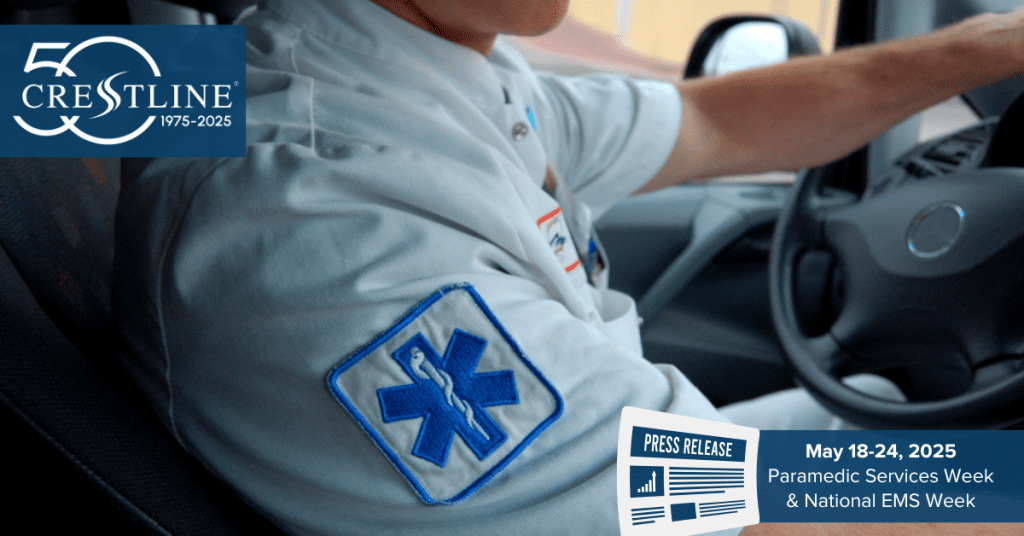 Close-up of a paramedic driving an ambulance, featuring the Star of Life patch on their sleeve and Crestline’s 50th anniversary logo promoting Paramedic Services Week and National EMS Week, May 18–24, 2025